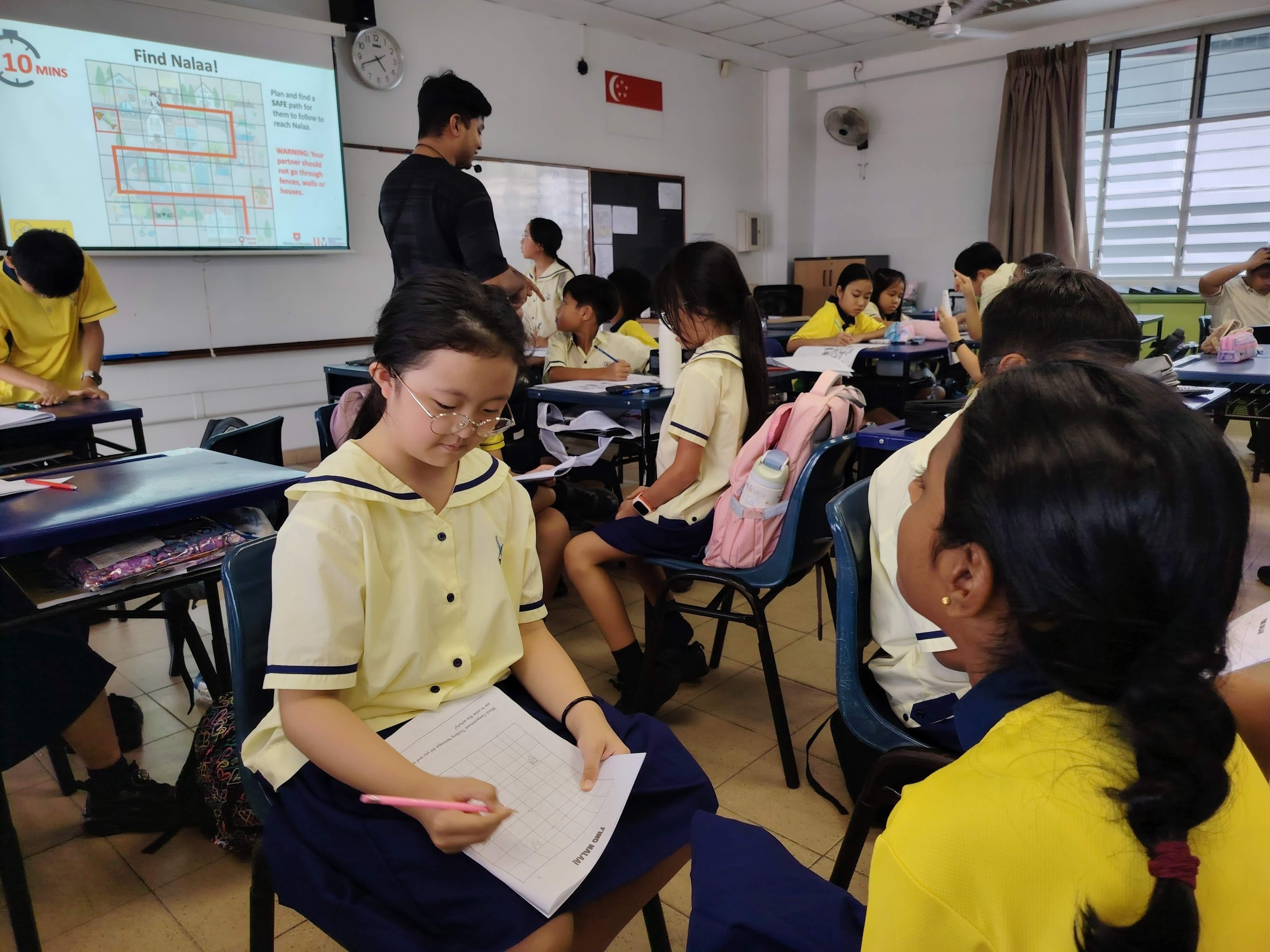 Students work together in pairs for computational thinking activities
